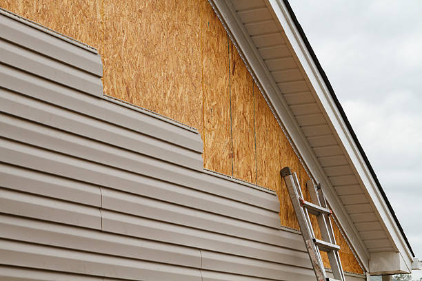 Professional Siding Installation technician working in Simpson, PA